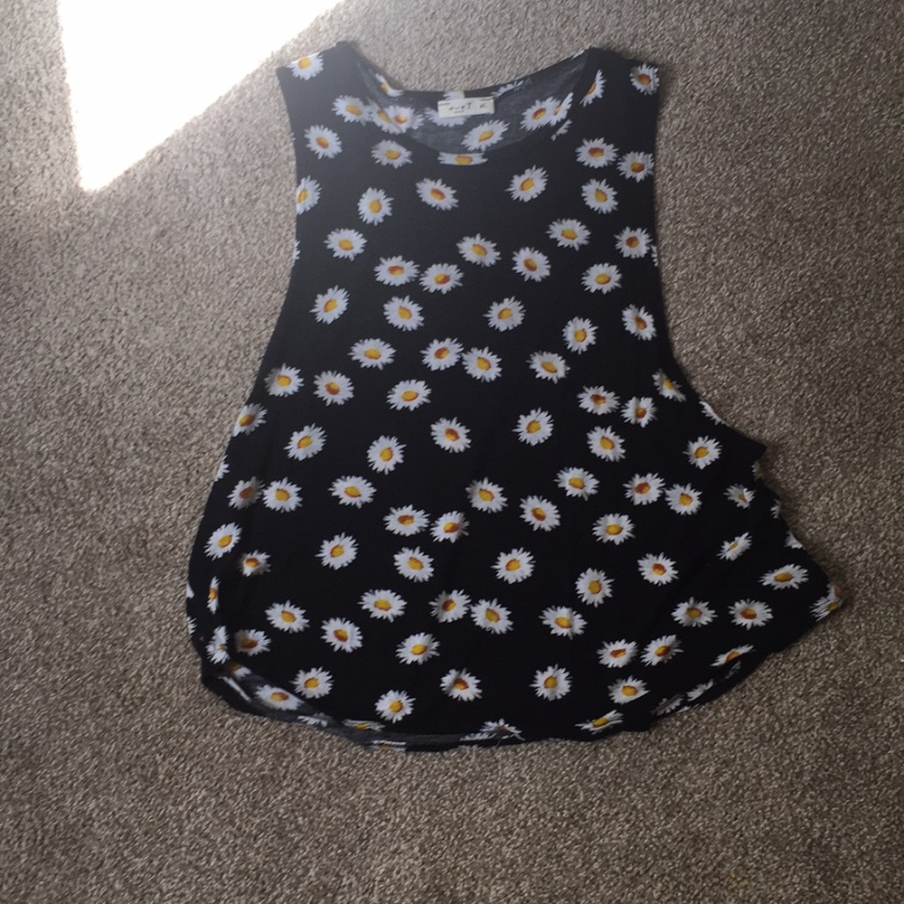 And adorable muscle tank with daisies on it